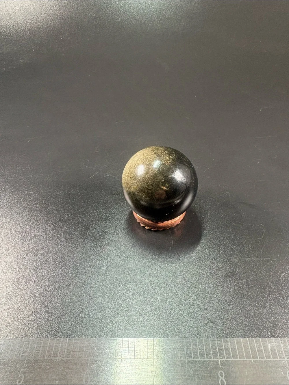 Black gemStone Sphere comes with copper ring and gemstone